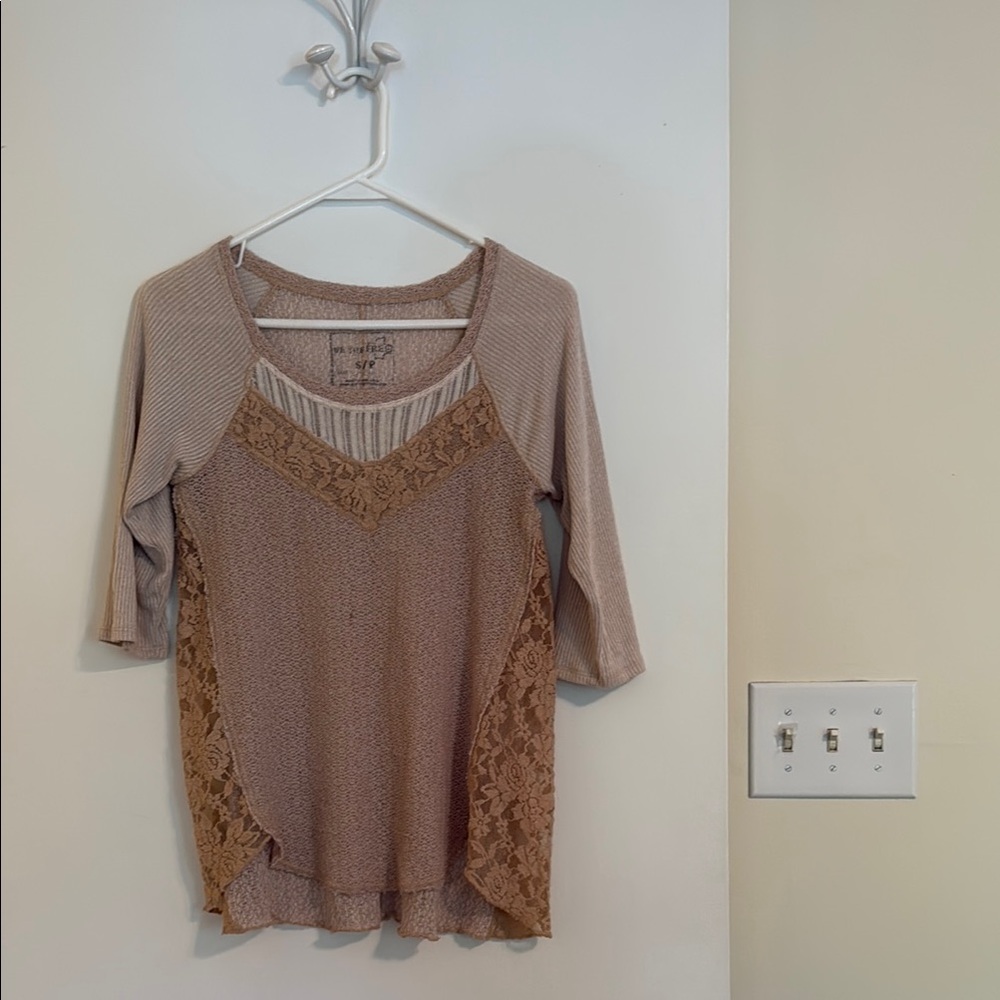 We the Free top. See through lace at sides.